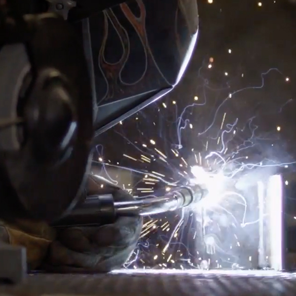 Close up on man welding
